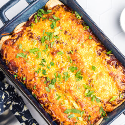 cranberry turkey enchiladas in a pan