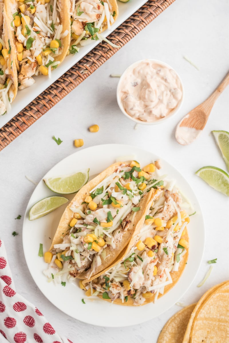 fish tacos on a white plate