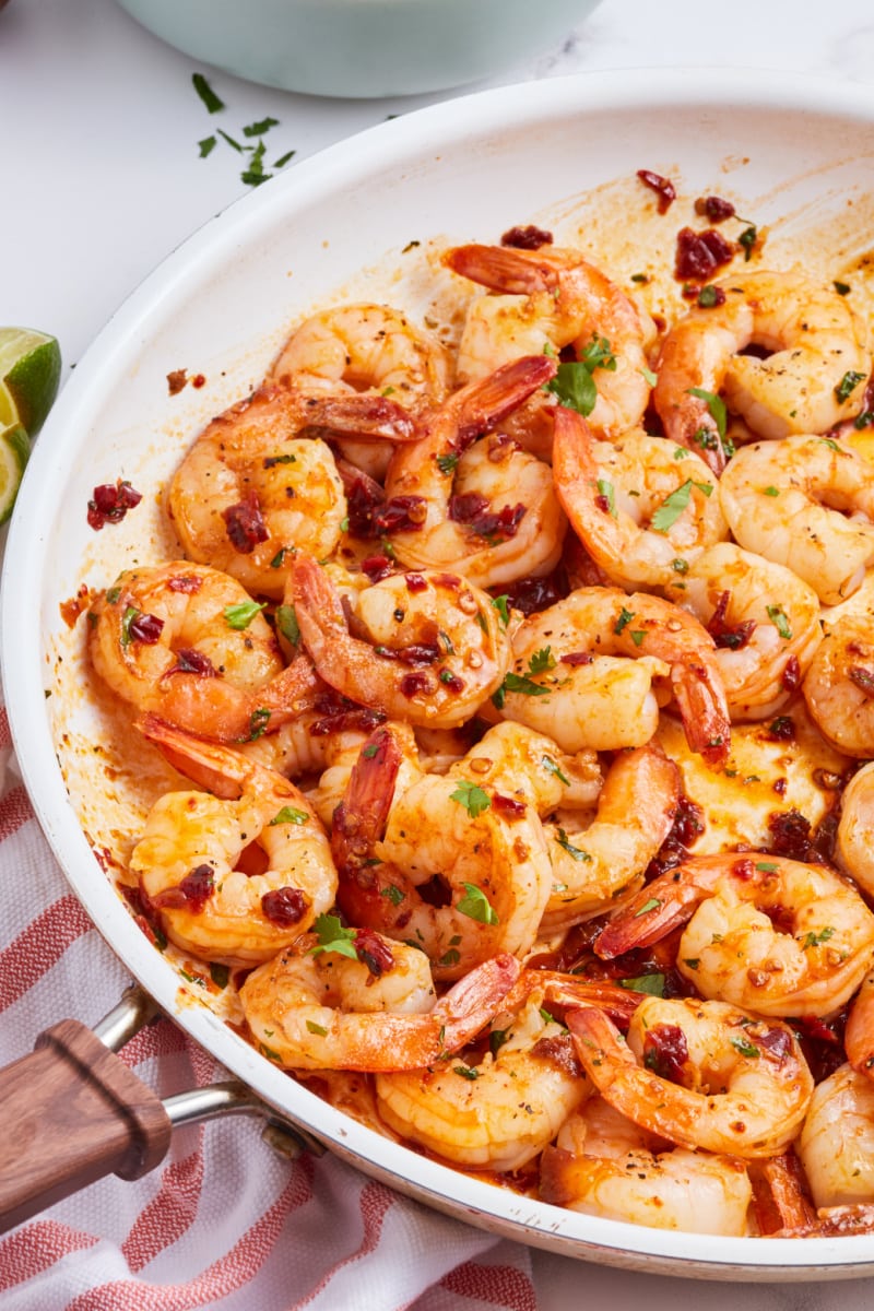 skillet with pan seared shrimp with chipotle lime glaze