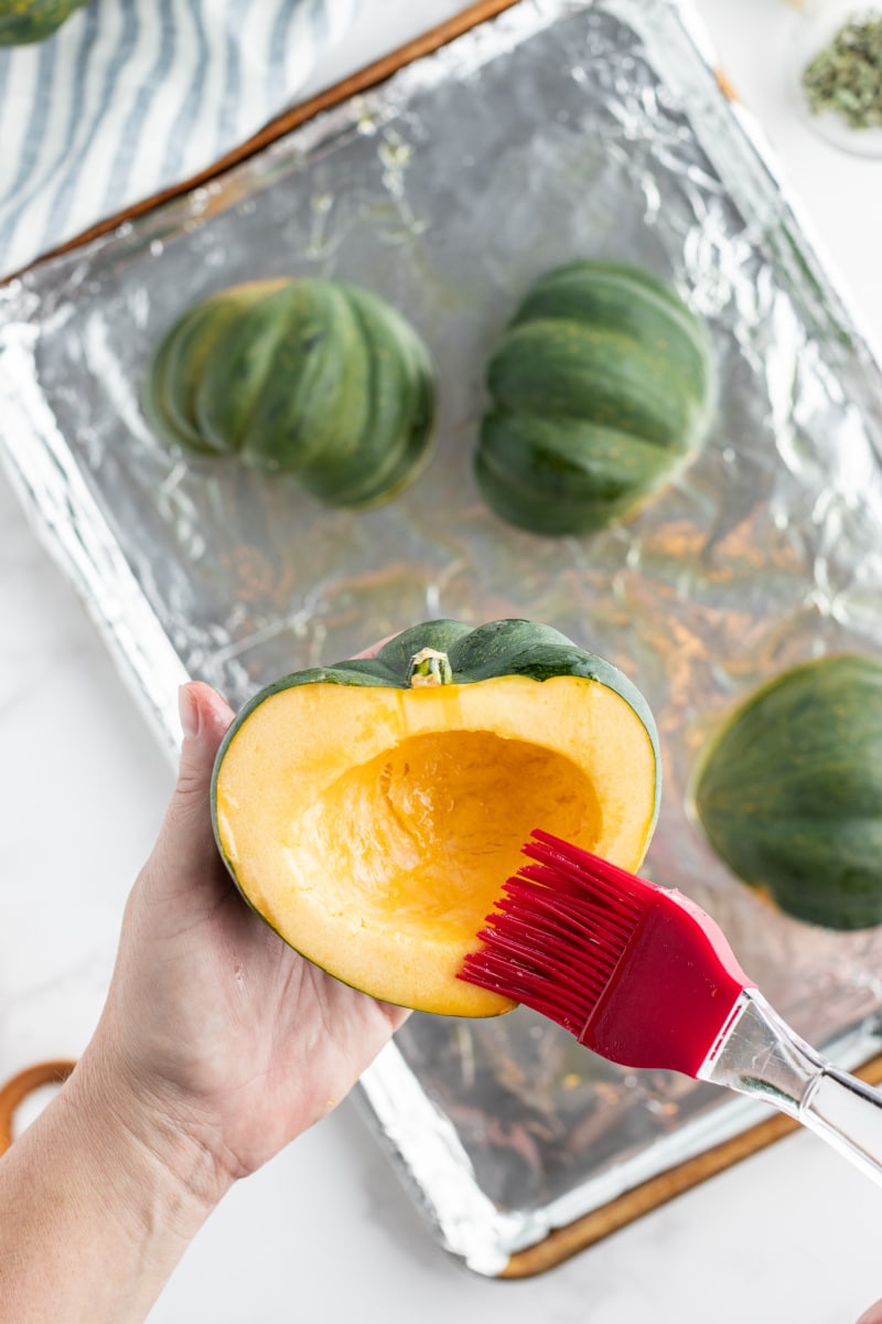 brushing winter squash with oil