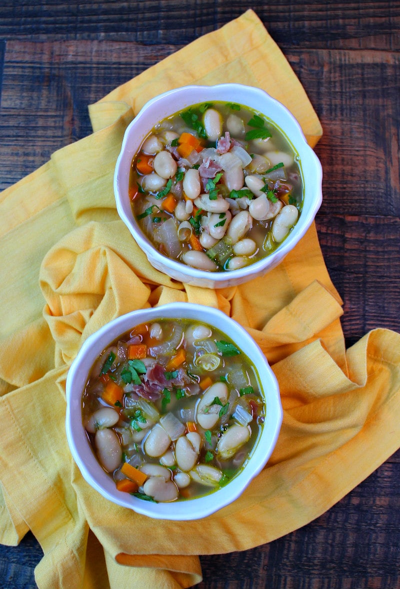 Two bowls of Tuscan White Bean Soup with Prosciutto