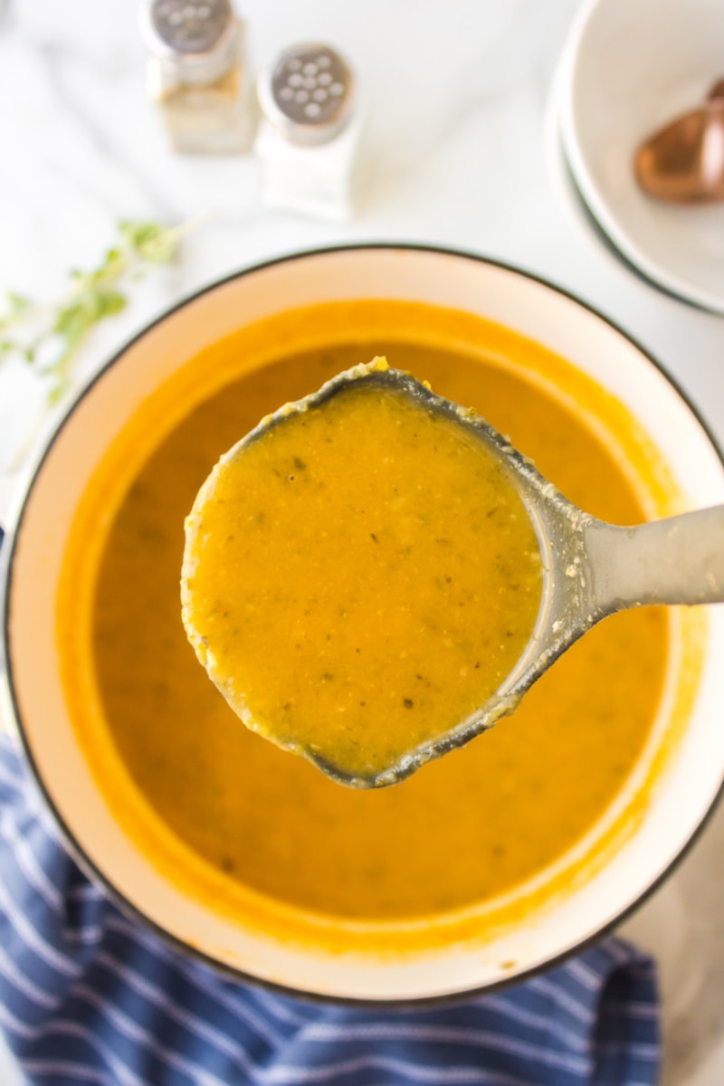 ladle full of zucchini soup