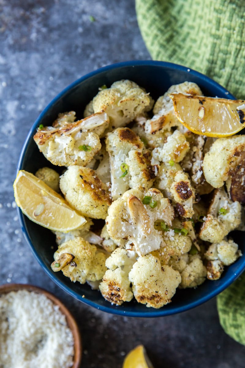 bowl of oven roasted cauliflower with lemon and parmesan