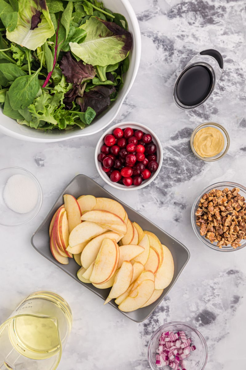 ingredients displayed for making apple walnut salad