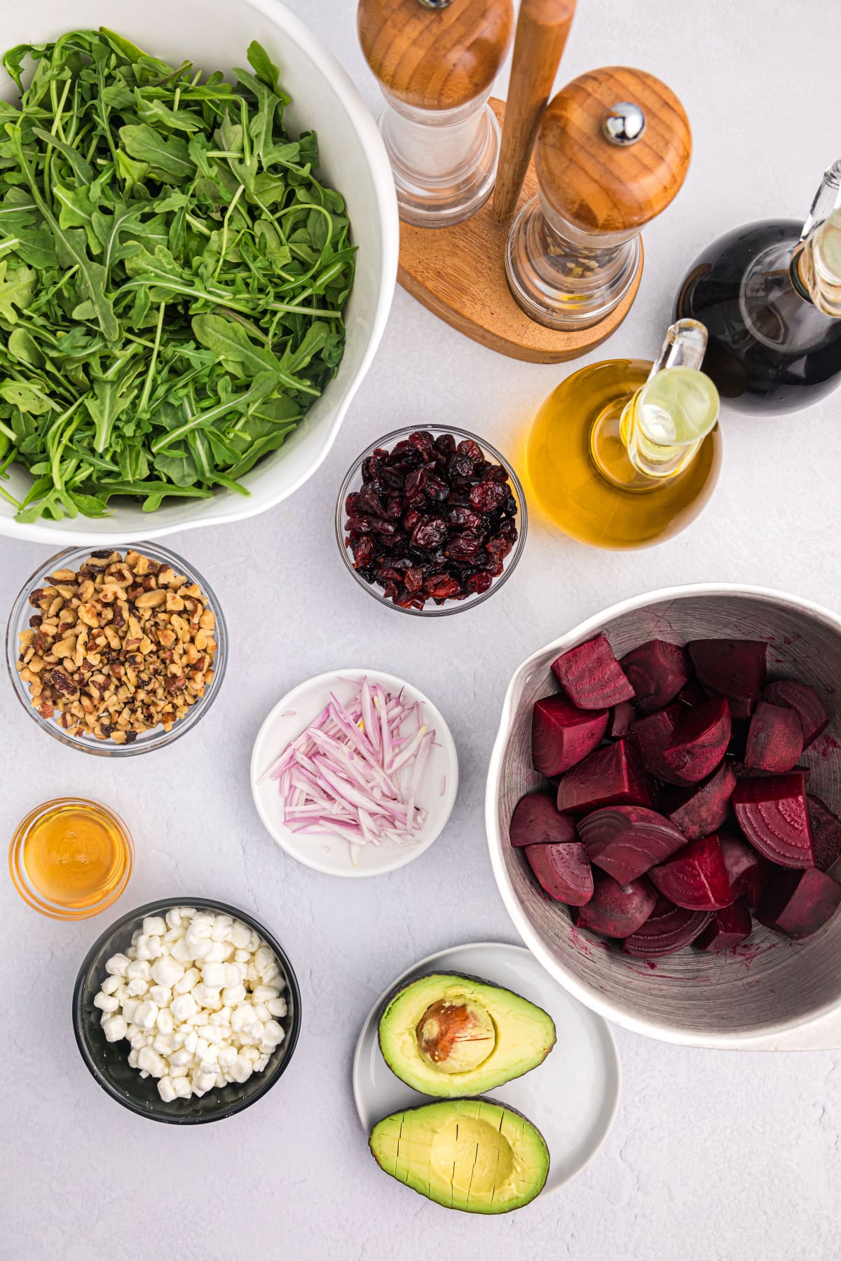 ingredients displayed for making beet and goat cheese arugula salad
