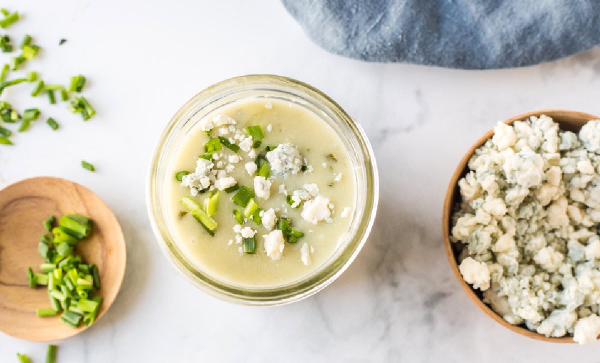 overhead shot of blue cheese steak sauce in jar