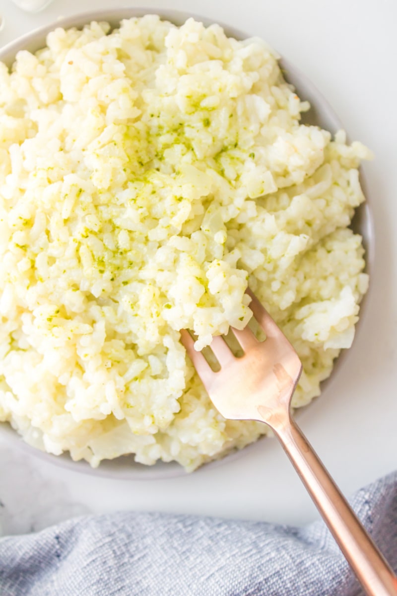 fork in a bowl of coconut ginger rice