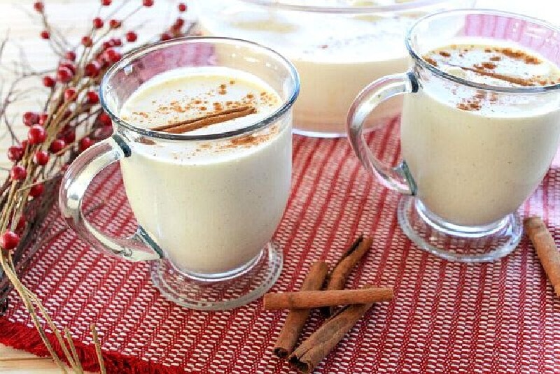 two mugs of eggnog punch