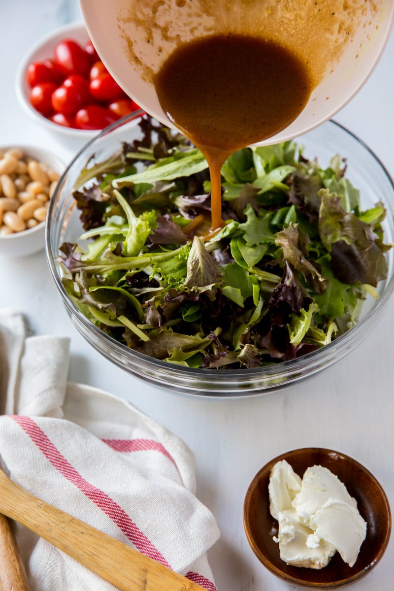 adding dressing to five minute salad