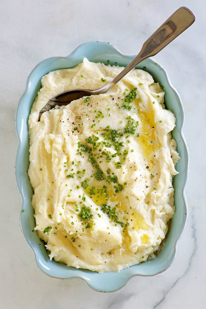 Casserole dish full of Make Ahead Mashed Potatoes