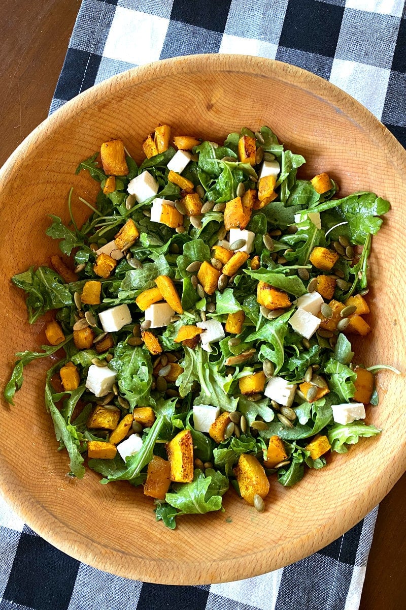 maple roasted pumpkin salad in a wooden bowl