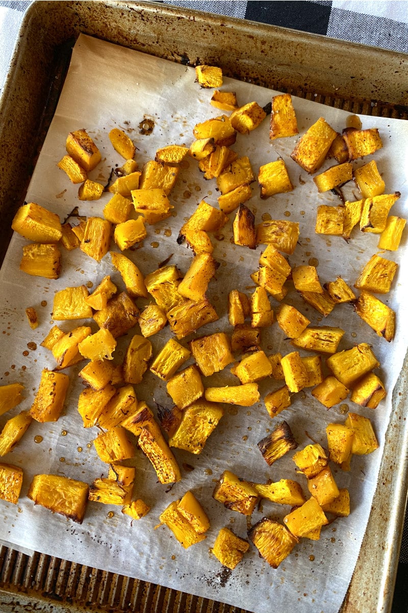 roasted pumpkin chunks on baking sheet