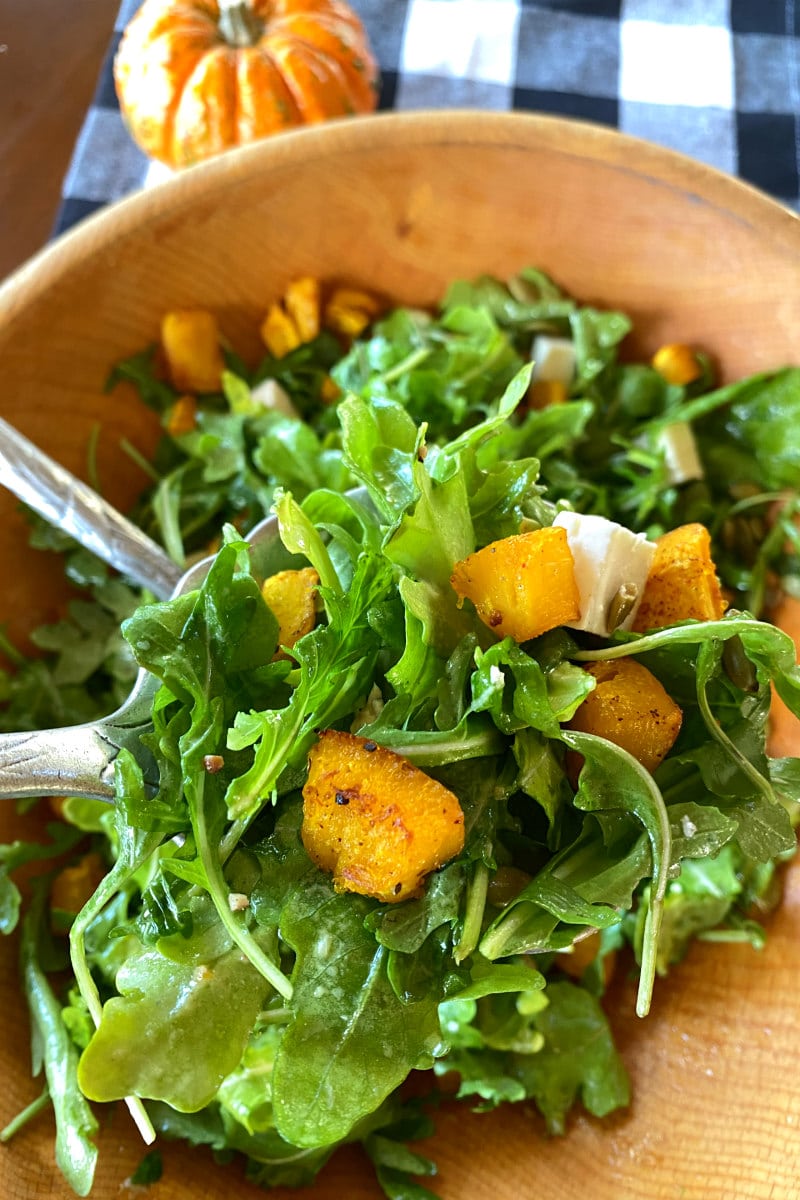 maple roasted pumpkin salad in wood bowl