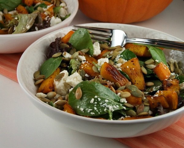 maple roasted pumpkin salad in a white bowl