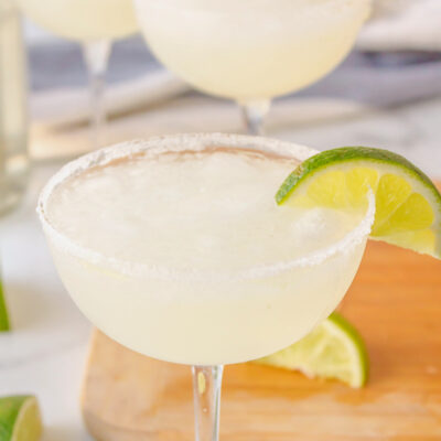 margarita in glass with lime wedge
