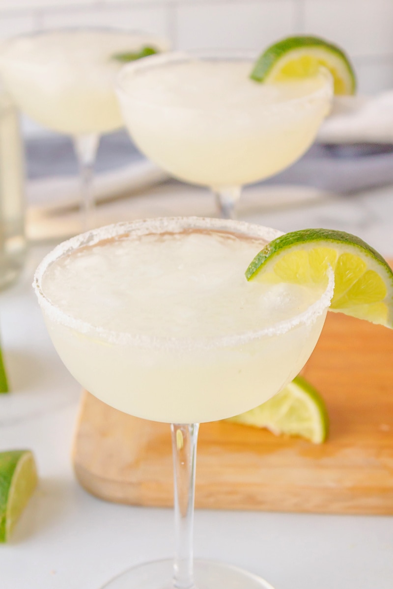 margarita in glass with lime wedge