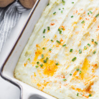 Creamy Oven Baked Mashed Potatoes in a Casserole Dish