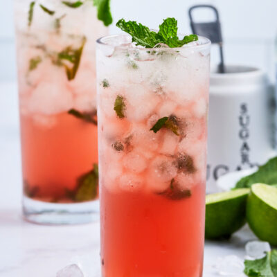 pomegranate mojitos in tall glasses