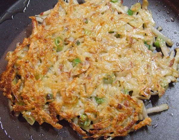 Potato pancakes potato scallion pancake in pan