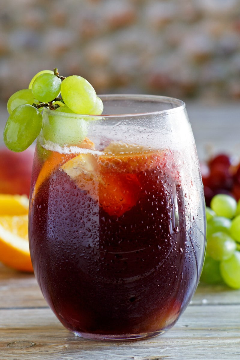 glass of Grape Sangria garnished with green grapes