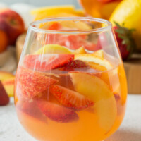 glass of strawberry peach sangria