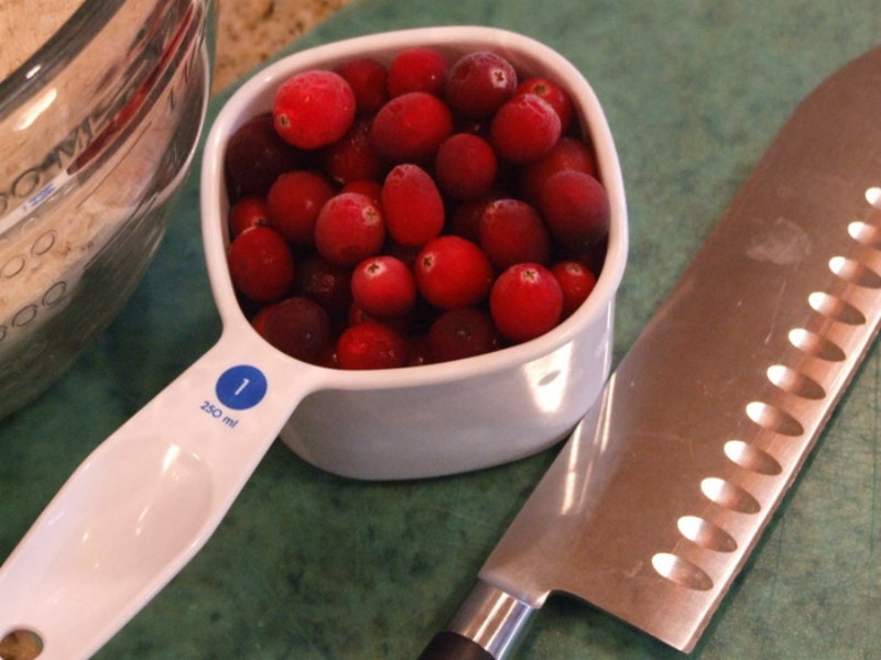 cranberries in measuring cup