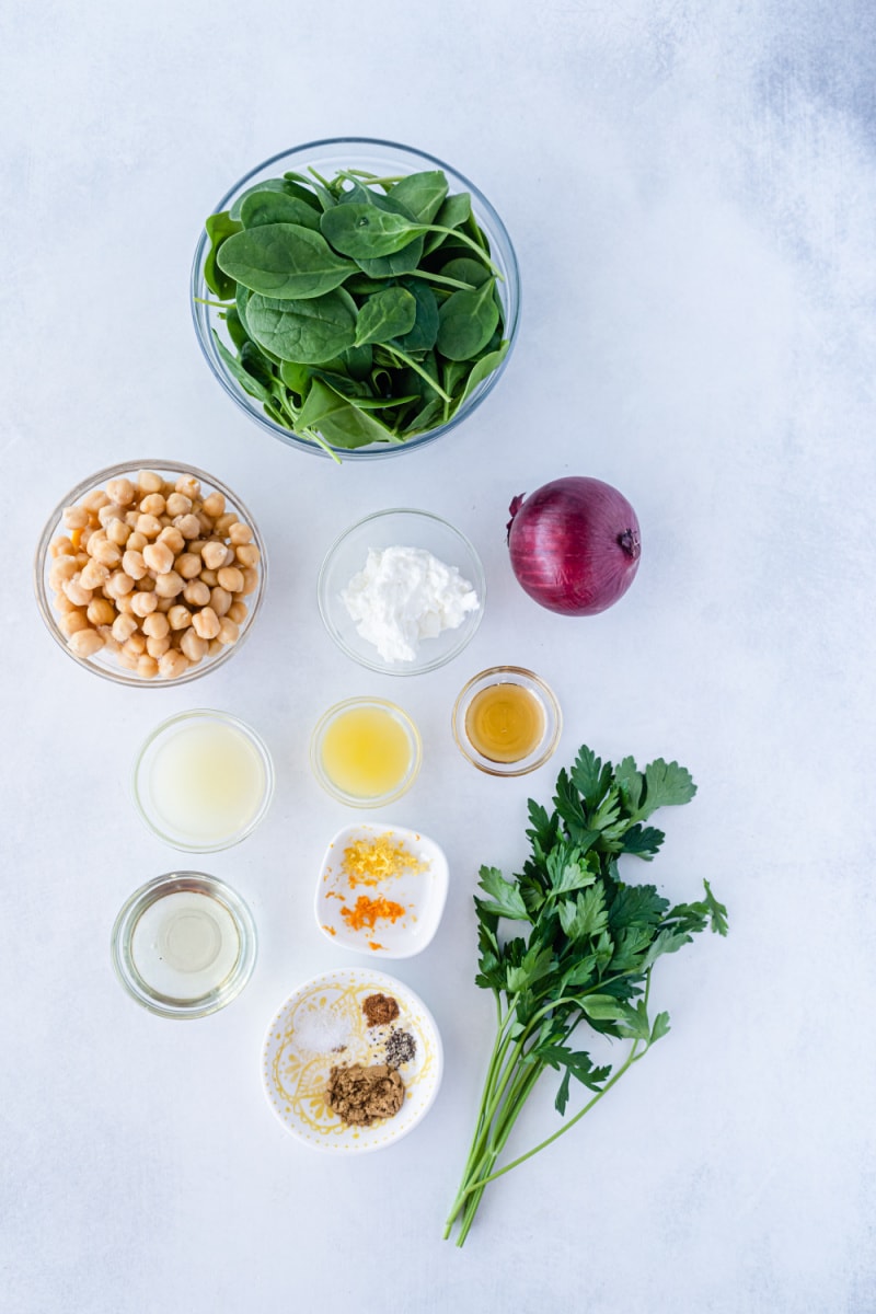 ingredients displayed for making chickpea and spinach salad