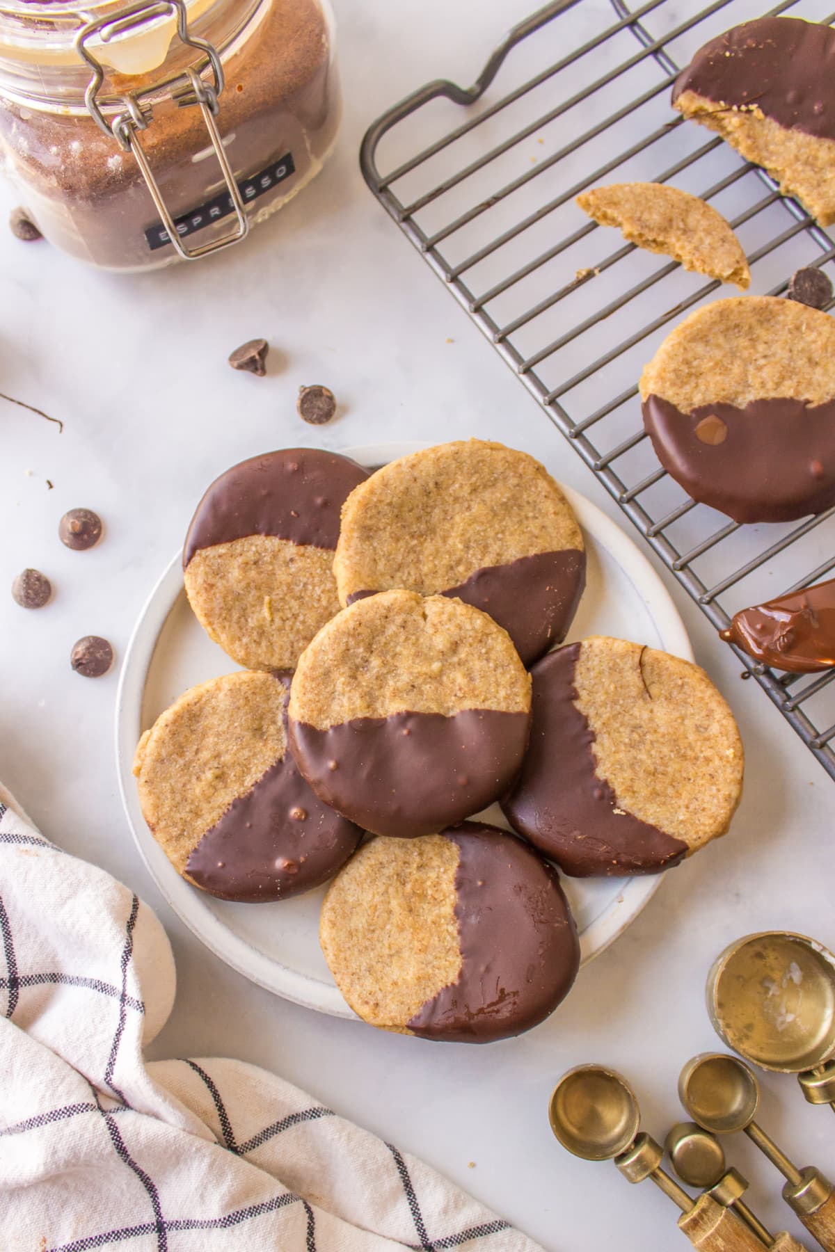 chocolate dipped espresso shortbread cookies on a platter