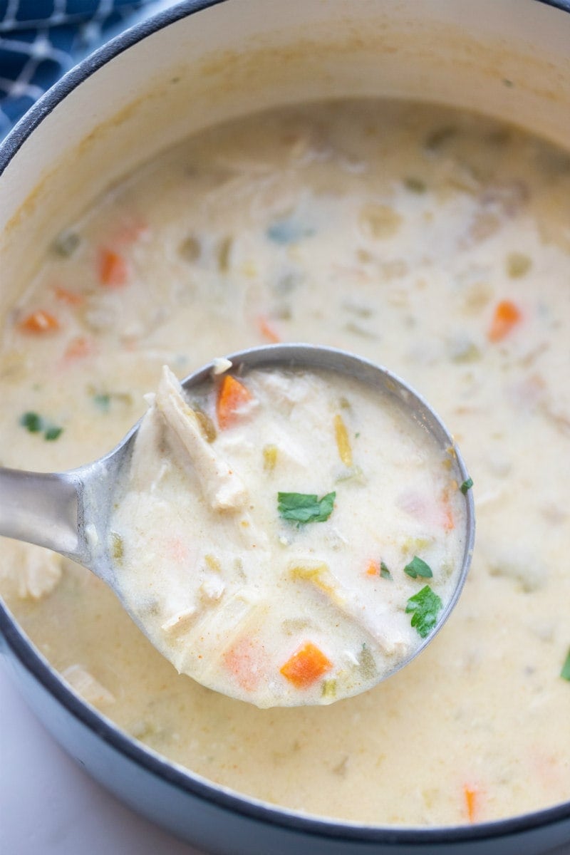 ladle scooping out Mexican turkey soup