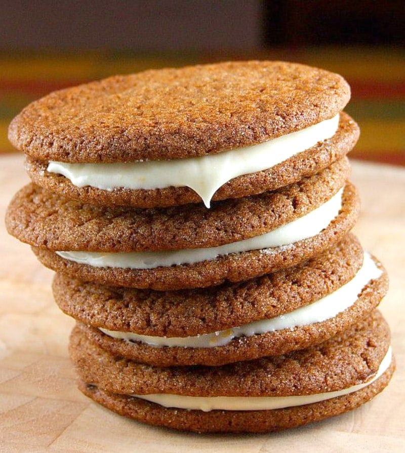 stack of 4 gingersnaps with orange cream filling