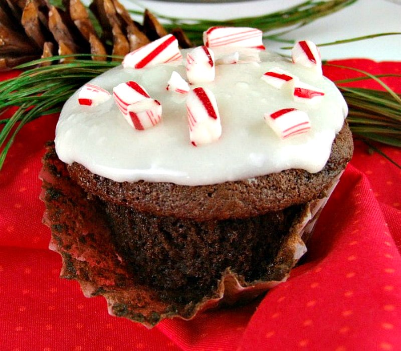 chocolate cupcakes with peppermint icing and candy canes