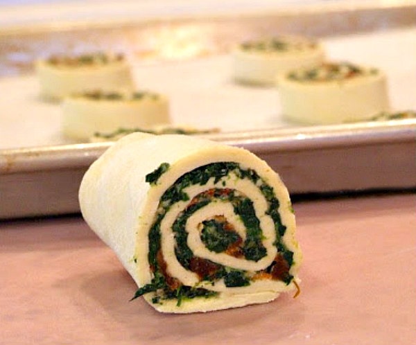 rolled up puff pastry with spinach and sundried tomato