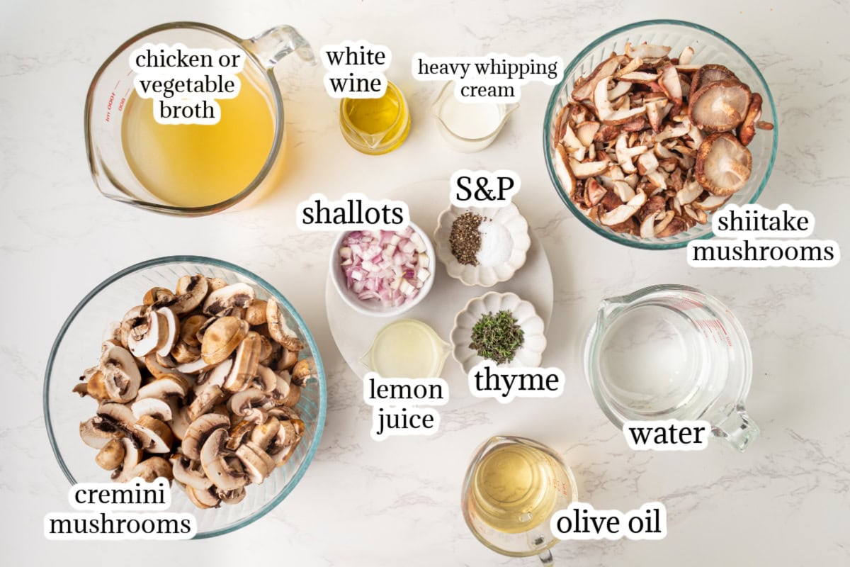 If you love mushrooms, you need to try this Roasted Mushroom Soup! Shiitake and cremini mushrooms are roasted to bring out their rich, earthy flavor, then combined with white wine, fresh thyme and a touch of cream. A delicious homemade soup for fall, winter or any cozy dinner! ingredients displayed for making roasted mushroom soup