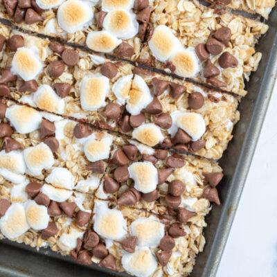 s'mores granola bars on a baking sheet cut into bars