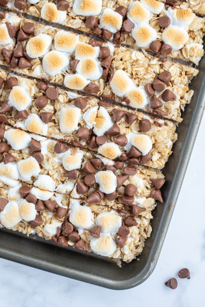 s'mores granola bars on a baking sheet cut into bars