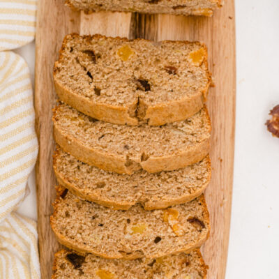 healthy whole wheat banana bread sliced on board