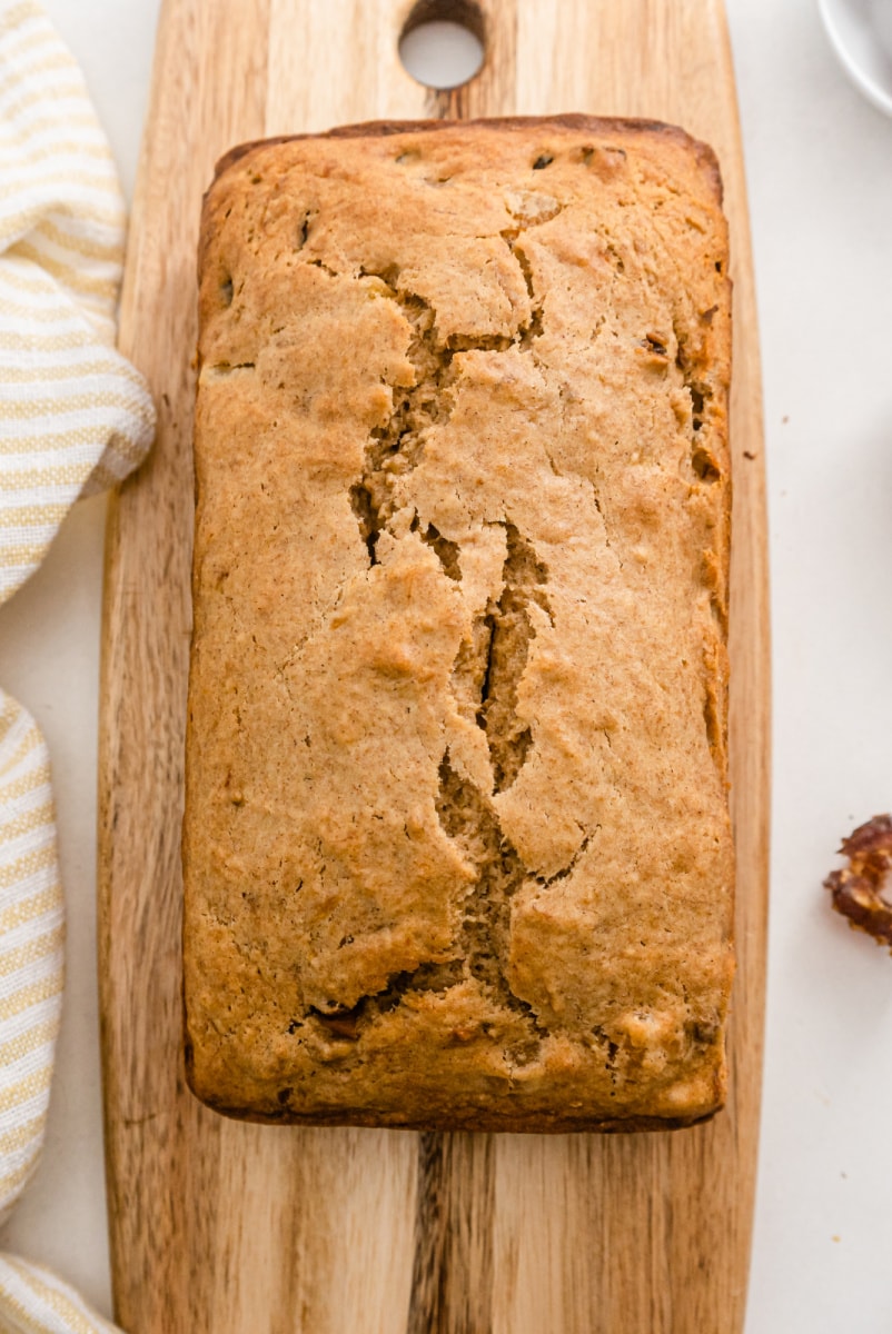 whole wheat healthy banana bread loaf on board