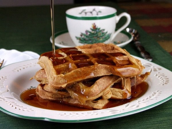 gingerbread waffles on christmas china with syrup