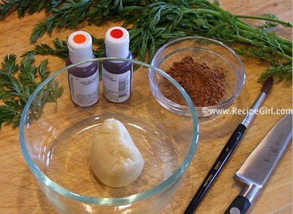 Ingredients for making marzipan carrots