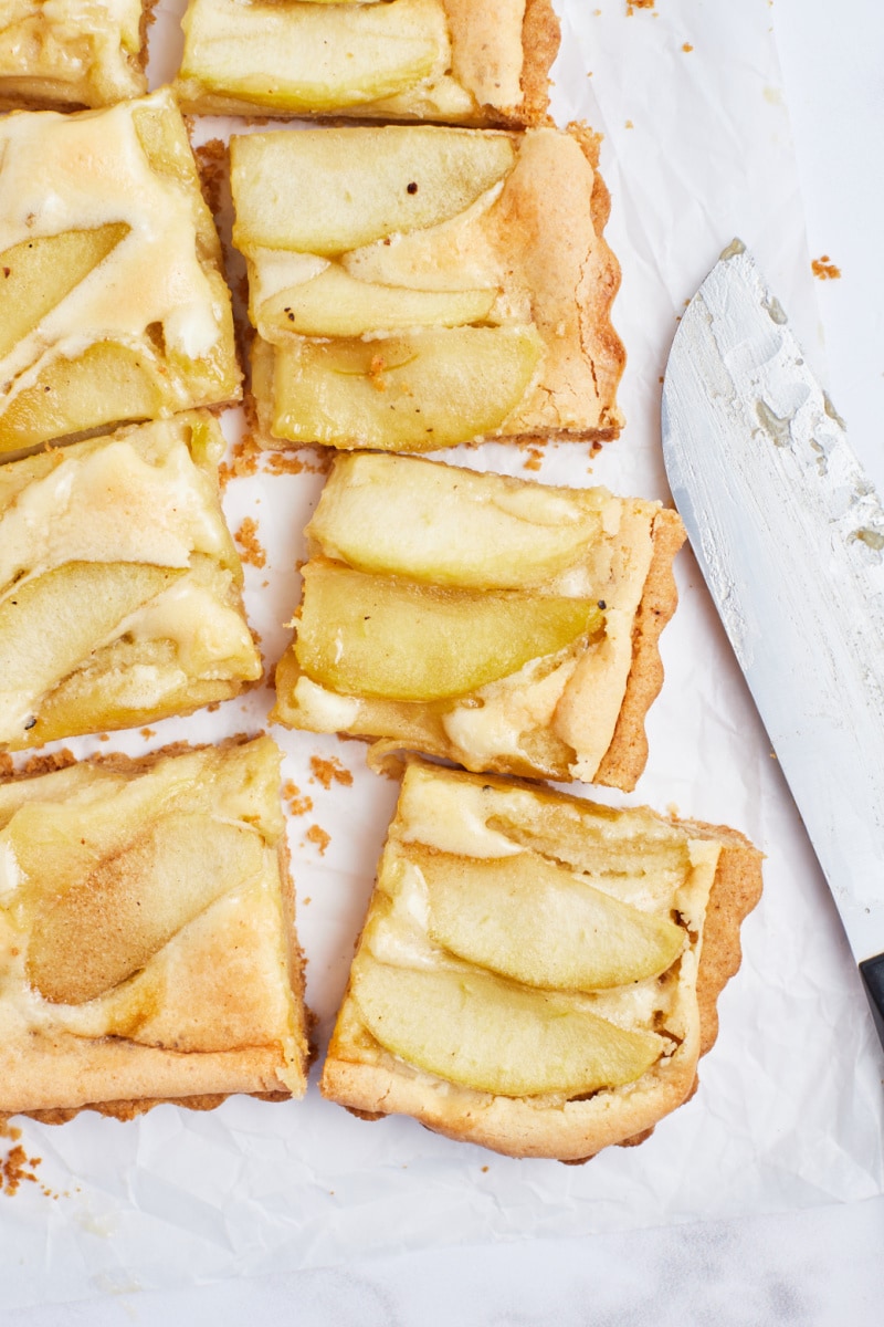 caramelized apple tart cut into pieces