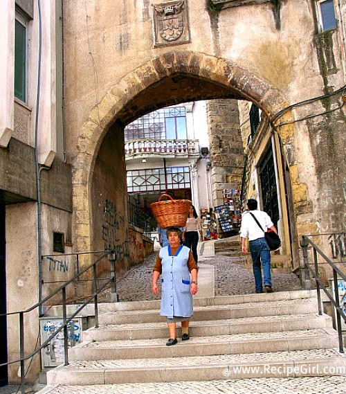 Woman with a basket in Lisbon, Portugal