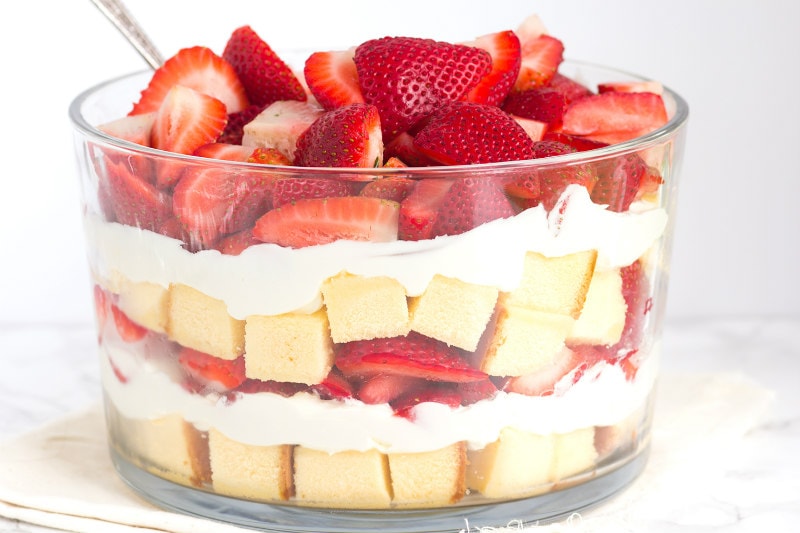 layered strawberry trifle in a glass trifle dish