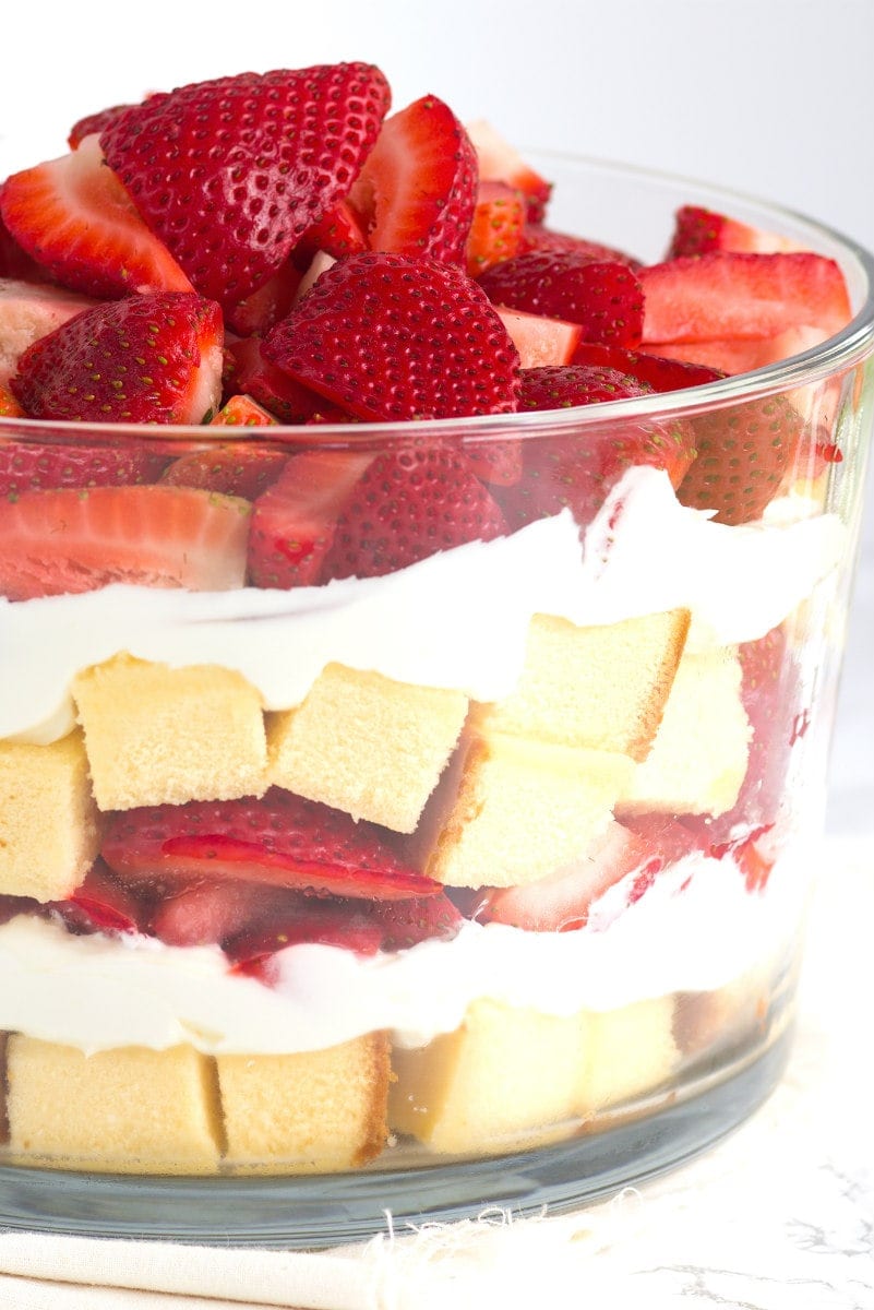 layered strawberry trifle in a glass trifle dish