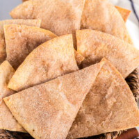 cinnamon bunuelos in a basket