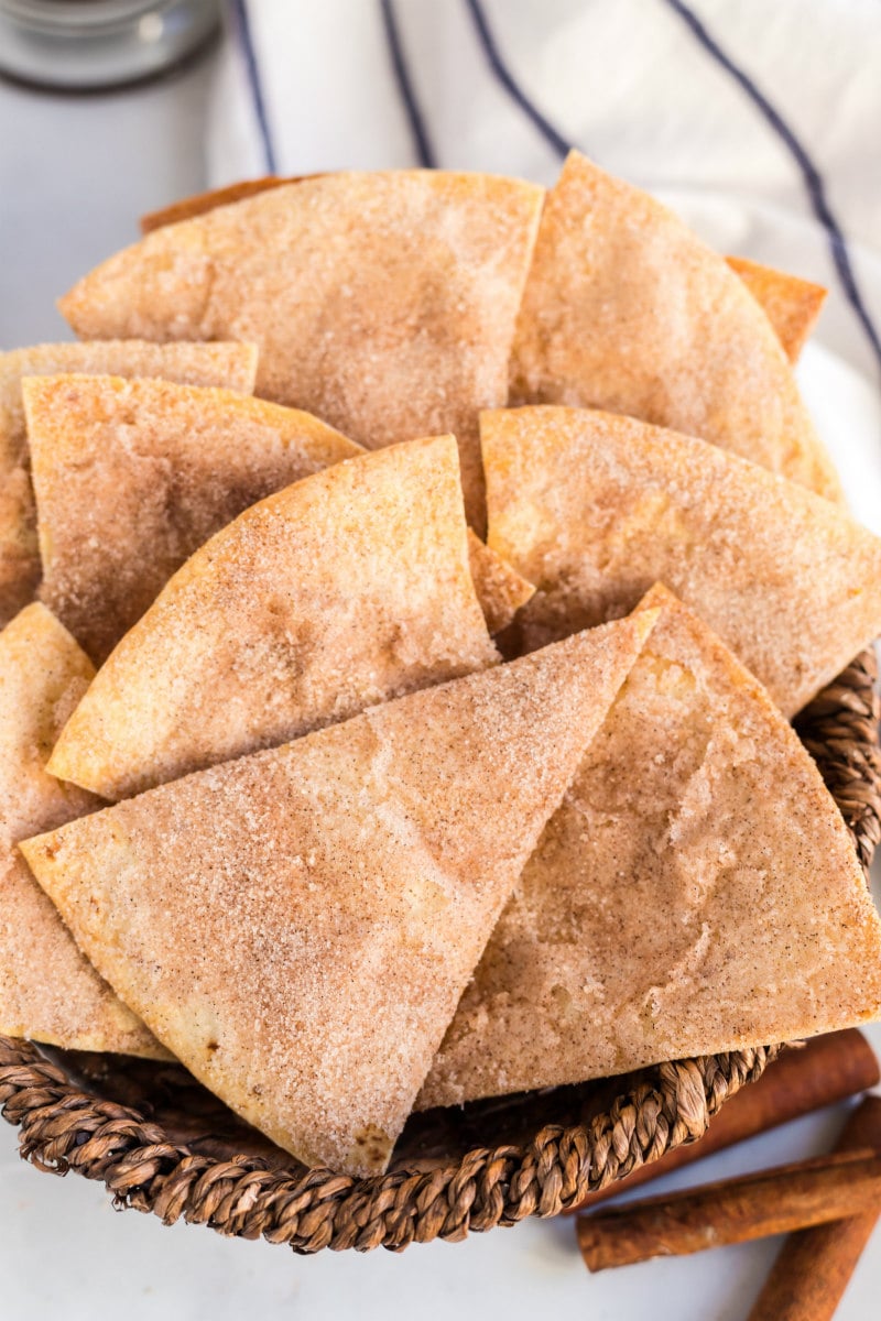 cinnamon bunuelos in a basket