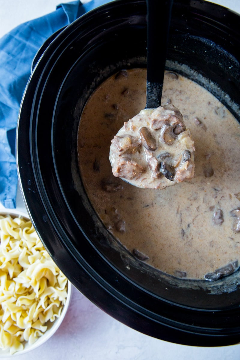 Lightened Up Slow Cooker Beef Stroganoff recipe from RecipeGirl.com #light #weightwatchers #ww #wwfreestyle #slow #cooker #slowcooker #crockpot #beef #stroganoff #recipe #RecipeGirl Slow Cooker Beef Stroganoff sauce