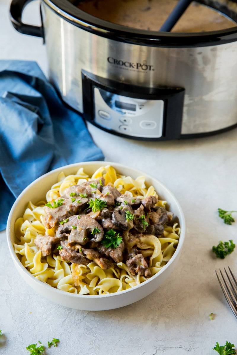 Best Slow Cooker Beef Stroganoff Recipe - This lightened- up Slow Cooker Beef Stroganoff is super simple to make. Let your slow cooker do the work for you and dinner will be done in 6 hours!