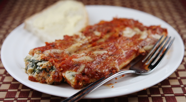 Spinach and Cheese Stuffed Manicotti on a white plate