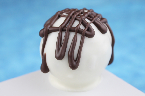 Chocolate Chip Cookie Dough Truffles made with white chocolate and drizzled with dark chocolate