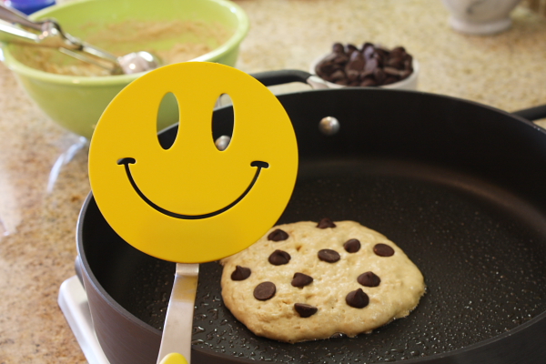 smiley face spatula making pancakes